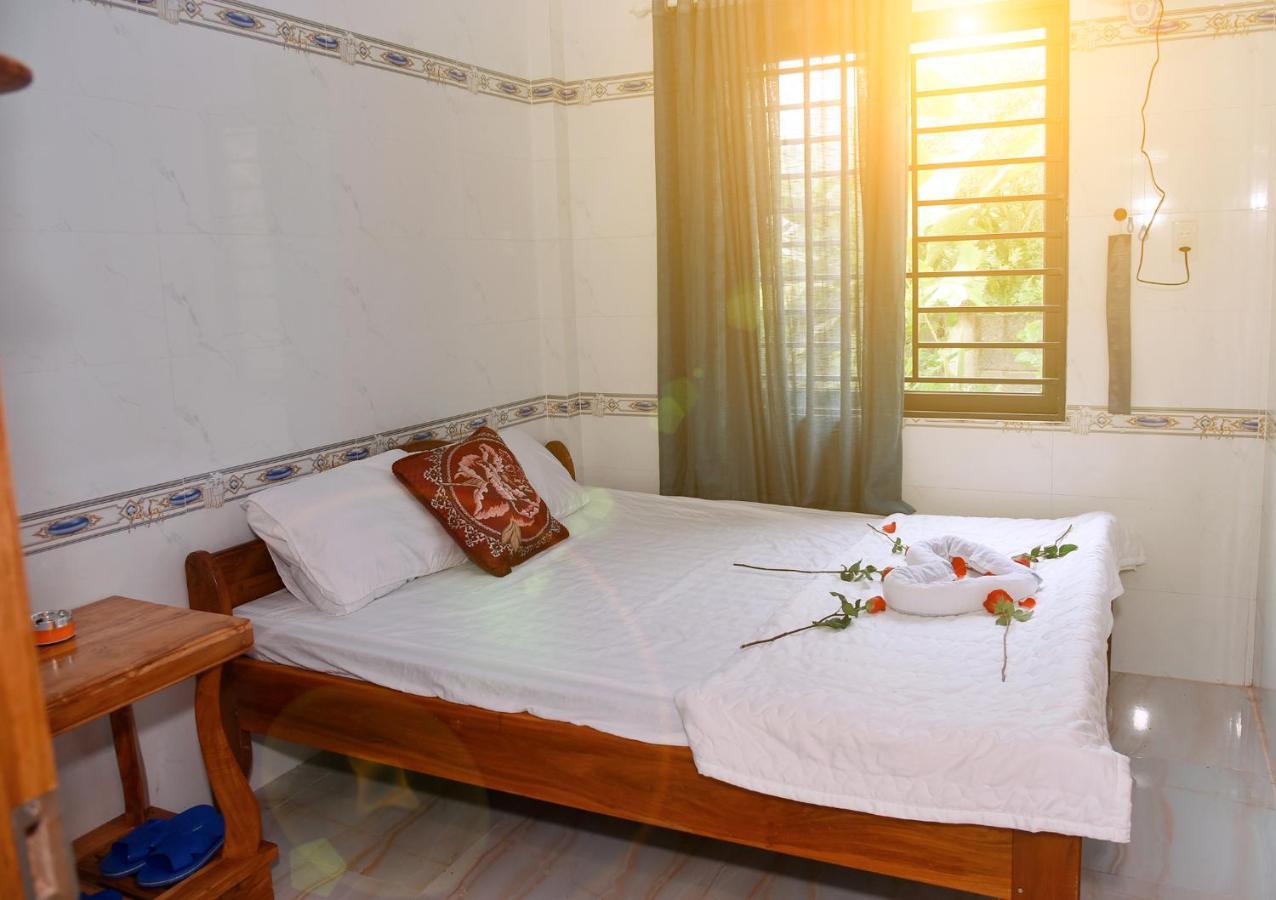 Hotel Nha Nghi Hoa Muoi Gio Tan Tao Exterior foto